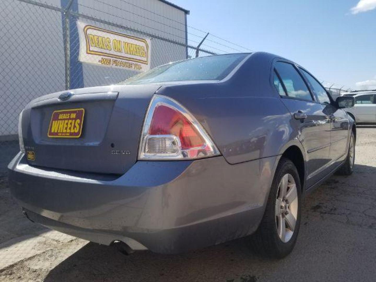 2006 Ford Fusion SE (3FAHP071X6R) with an Duratec 30 3L V-6 DOHC engine, located at 4047 Montana Ave., Billings, MT, 59101, 45.770847, -108.529800 - Photo#4