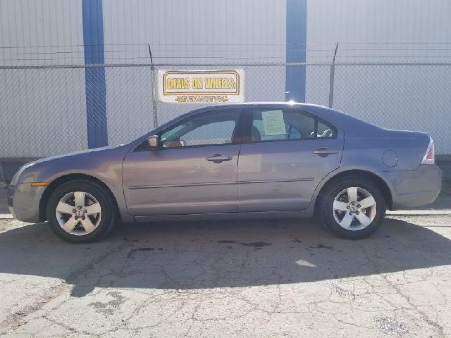 2006 Ford Fusion SE (3FAHP071X6R) with an Duratec 30 3L V-6 DOHC engine, located at 4047 Montana Ave., Billings, MT, 59101, 45.770847, -108.529800 - Photo#6