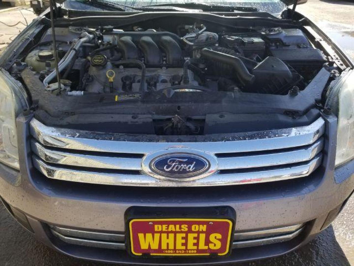 2006 Ford Fusion SE (3FAHP071X6R) with an Duratec 30 3L V-6 DOHC engine, located at 4047 Montana Ave., Billings, MT, 59101, 45.770847, -108.529800 - Photo#13
