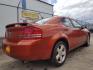 2008 Sunburst Orange Pear Dodge Avenger SXT (1B3LC56R08N) with an 2.7L V6 DOHC 24V FFV engine, 4-Speed Automatic transmission, located at 601 E. Idaho St., Kalispell, MT, 59901, (406) 300-4664, 0.000000, 0.000000 - Photo#4
