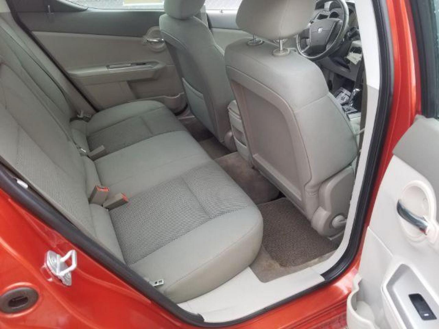 2008 Sunburst Orange Pear Dodge Avenger SXT (1B3LC56R08N) with an 2.7L V6 DOHC 24V FFV engine, 4-Speed Automatic transmission, located at 601 E. Idaho St., Kalispell, MT, 59901, (406) 300-4664, 0.000000, 0.000000 - Photo#9