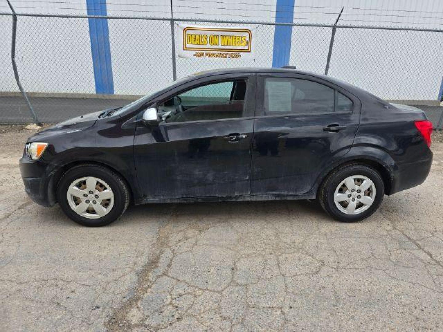 2016 Chevrolet Sonic LS Auto Sedan (1G1JA5SH2G4) with an 1.8L L4 DOHC 24V engine, 6-Speed Automatic transmission, located at 1800 West Broadway, Missoula, 59808, (406) 543-1986, 46.881348, -114.023628 - Photo#0