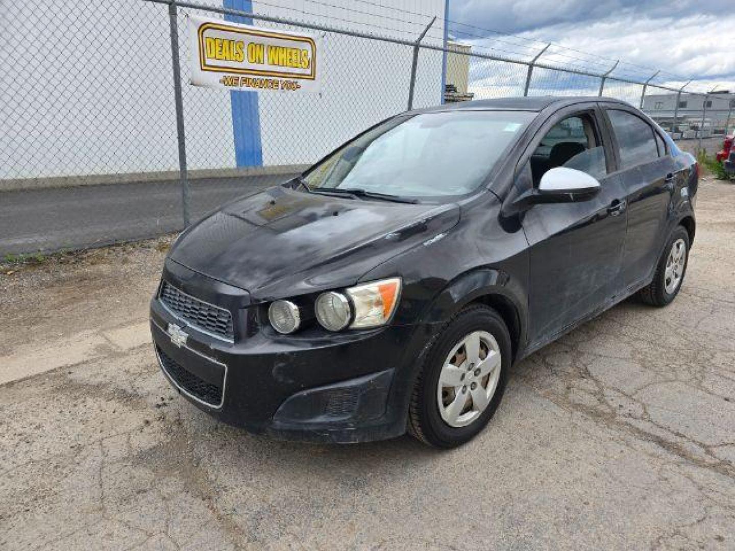 2016 Chevrolet Sonic LS Auto Sedan (1G1JA5SH2G4) with an 1.8L L4 DOHC 24V engine, 6-Speed Automatic transmission, located at 1800 West Broadway, Missoula, 59808, (406) 543-1986, 46.881348, -114.023628 - Photo#1