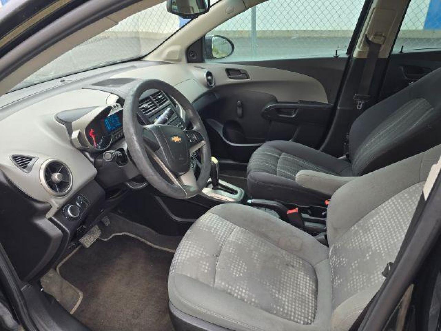 2016 Chevrolet Sonic LS Auto Sedan (1G1JA5SH2G4) with an 1.8L L4 DOHC 24V engine, 6-Speed Automatic transmission, located at 1800 West Broadway, Missoula, 59808, (406) 543-1986, 46.881348, -114.023628 - Photo#5